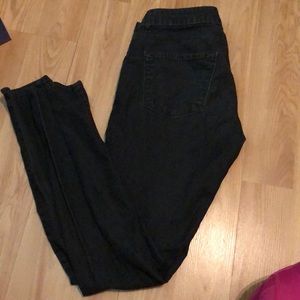 A pair of size 28 Rich & Skinny jeans